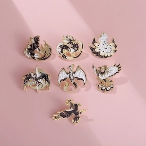 7-piece set of black and white enamel pins with dragon and phoenix designs