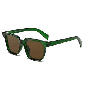 Retro square sunglasses with translucent dark green frames and brown lenses on white backdrop