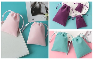 Detailed plush velvet drawstring jewelry pouches in pink, purple, and mint green colors