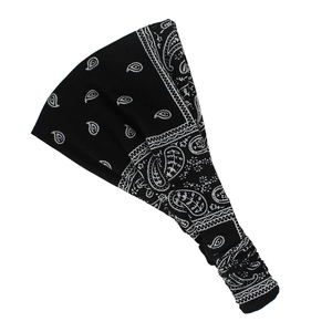 Detailed view of bohemian style black paisley pattern elastic headband for women