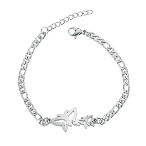 Detailed view of a silver butterfly charm on a stainless steel couple's bracelet
