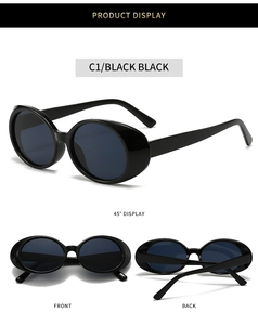 Detailed views of vintage oval black sunglasses with thick frames from multiple angles