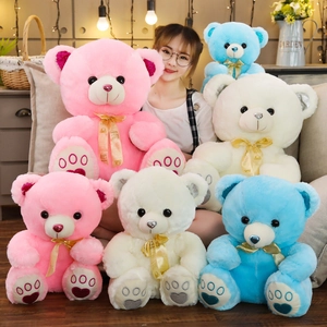 Cute teddy bears with gold ribbons in pink, blue and white, soft plush doll collection
