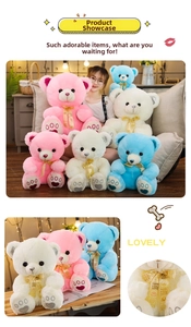 Close-up of colorful teddy bears with Love You ribbons and heart-patterned paws