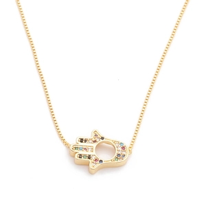 Golden Hamsa Hand necklace with colorful cubic zirconia stones on white background