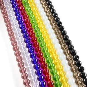 Polished round crystal glass spacer beads in various vibrant colors for jewelry making