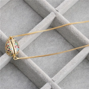 Exquisite gold copper necklace with shell pendant inlaid with colorful zircons on box chain
