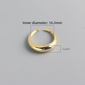 Detail shot of minimalist gold ring showing 16.5mm inner diameter and 5.2mm width