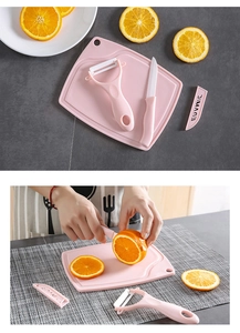 Pink 3-piece ceramic fruit knife set including peeler, paring knife and small cutting board