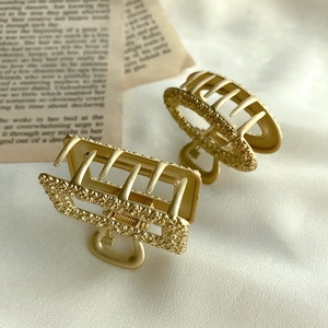 Vintage matte gold alloy hair claw clips in rectangular and oval floral frame designs