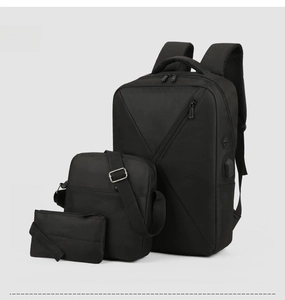 Three-piece black business backpack set featuring durable fabric and side USB charging port