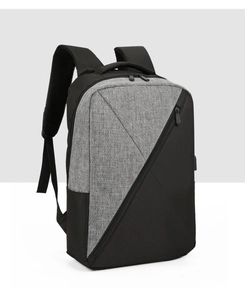 Detail view of Oxford fabric laptop backpack with dual-tone design and USB port features