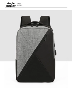 Detail of grey Oxford business backpack showing USB port and front zipper pocket