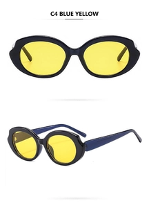 Detail view of oval sunglasses featuring a deep blue frame and bright yellow lenses