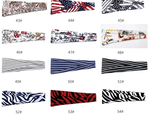 Grid display of 12 printed yoga headbands with floral, geometric, and zebra patterns