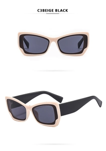 Nahaufnahme der zweifarbigen Cat-Eye-Sonnenbrille in Beige und Schwarz