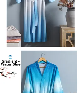Close-up detail of gradient water blue waffle weave fabric on soft unisex bathrobe