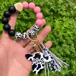 Silicone bead keychain bracelet with cow print beads, Mama pendant and pink tassel