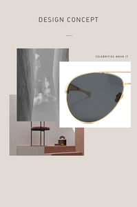 Close-up of golden metal frame aviator sunglasses with dark grey polarized lenses