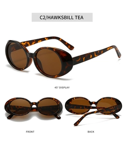 Three-angle views of retro oval sunglasses in hawksbill tea finish with brown lenses