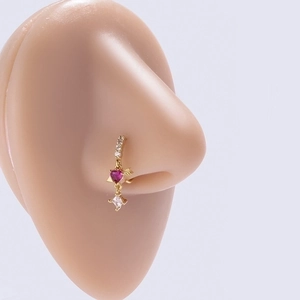 Nose hoop featuring pink heart and clear diamond zircon charms on a gold ring base