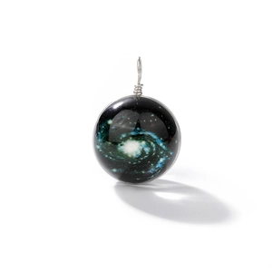 Macro shot of galaxy glass orb pendant with intricate nebula swirls and silver wire wrap