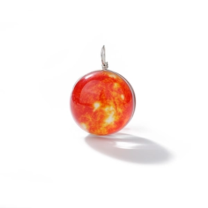 Detailed view of red and orange galaxy glass pendant wrapped in silver wire jewelry