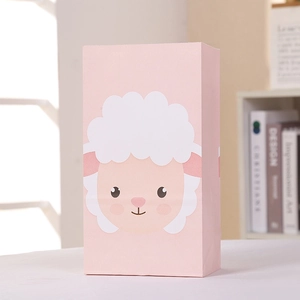 Pink paper gift bag featuring a cute white lamb illustration for party favors