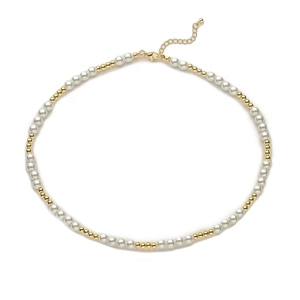 Detail of baroque pearl necklace with gold beads and adjustable lobster clasp closure
