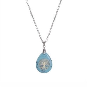 Silver life tree necklace with waterdrop turquoise stone pendant on white background