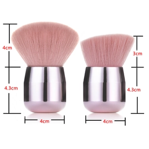 Pink mushroom powder brush set with soft synthetic bristles and purple metallic handles