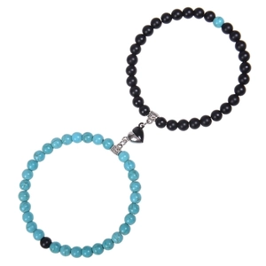 Detail of pink zebra stone couple bracelets with heart-shaped magnetic suction clasp