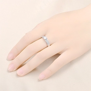 Elegant silver stainless steel ring featuring double row zircon accents and a center stone