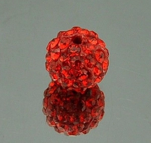 Macro view of 10mm red clay disco ball bead with sparkling rhinestones and drill hole