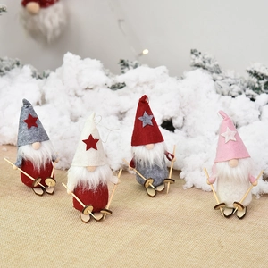 Set of 4 Christmas gnome ornaments with wooden skis for festive indoor tree decoration