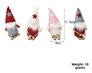 Detail view of 11.5cm plush skiing gnome ornaments with wooden skis and wool hats