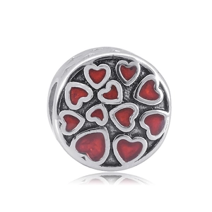 Silver mermaid style charm with red enamel heart patterns and mirror reflection