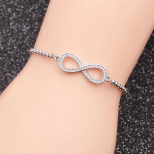Adjustable infinity symbol bracelet in polished silver stainless steel with micro-inlaid stones