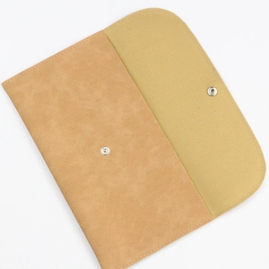 Brown faux suede envelope makeup brush bag with silver snap button and canvas lining