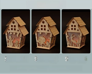 Detailed view of large wooden LED Christmas house ornament with warm glowing light effect