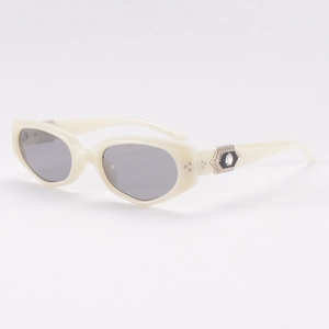 Chic off-white cat eye sunglasses with polygonal resin frames and crystal metal accents