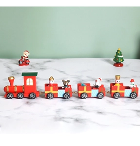 Detailed view of red and green wooden Christmas train set with festive figurines