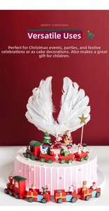 Christmas themed wooden train with Santa and reindeer on cake with white feather wings