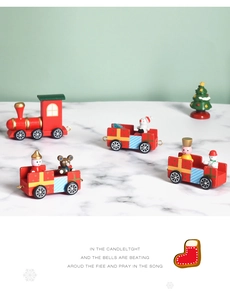 Detailed close-up of a wooden Christmas train with a red locomotive and festive figurines
