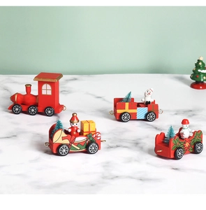 Detailed view of a wooden Christmas train with Santa and snowman on marble surface