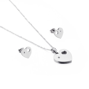Elegant heart jewelry set including silver necklace and stud earrings with tiny diamonds