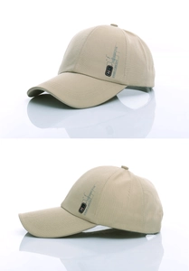 Side view detail of a cotton baseball cap with vertical text print and square logo patch