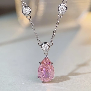 Elegant S925 sterling silver necklace with a pear-shaped pink gemstone and white zircons