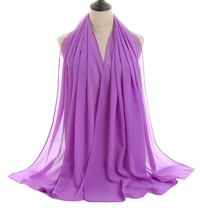 Detail of purple breathable chiffon shawl on mannequin showing texture and drape