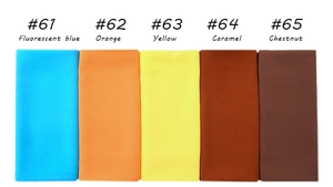 Close-up of pearl chiffon hijabs in fluorescent blue, orange, yellow and caramel colors